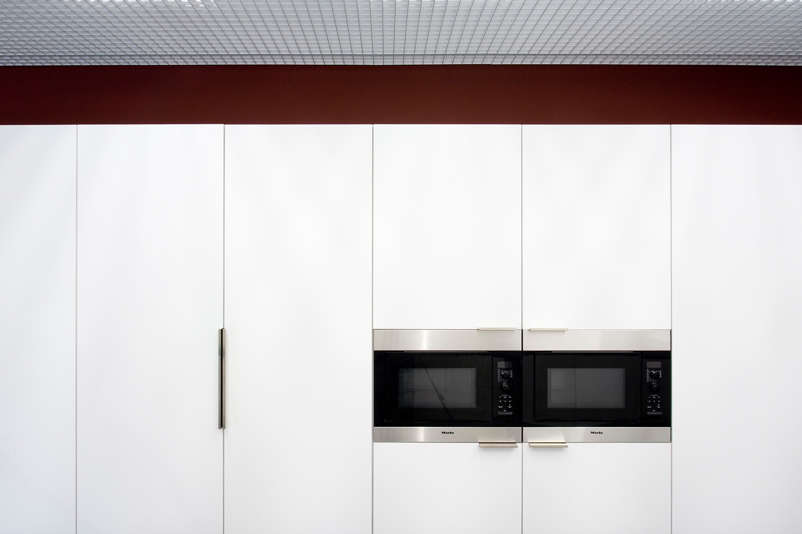 View of kitchen cabinets.