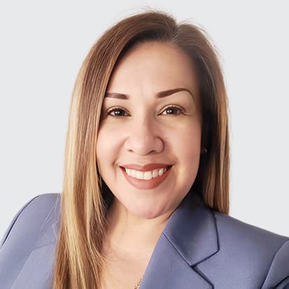 Person with long hair wearing a blazer. Person with long hair wearing a blazer.