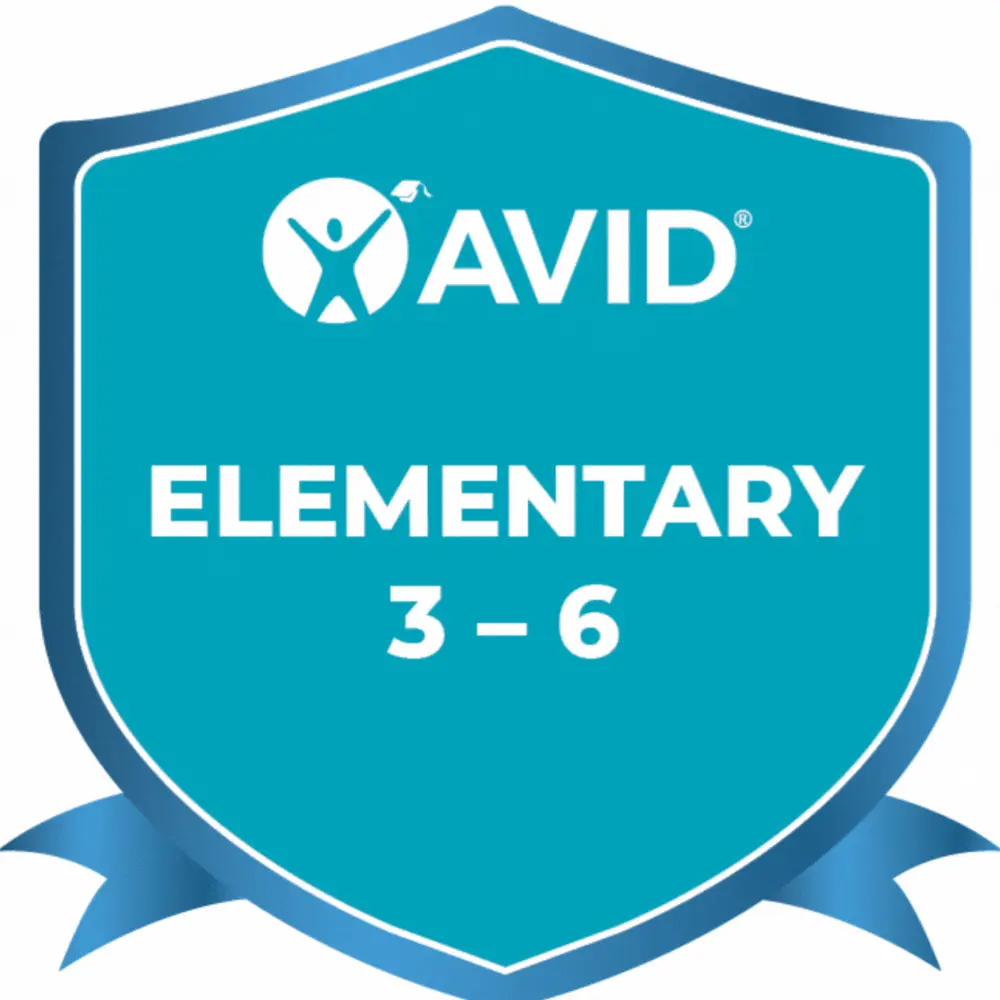 A blue shield-shaped badge with the text 'AVID' and 'ELEMENTARY 3-6' and a blue ribbon at the bottom. A blue shield-shaped badge with the text 'AVID' and 'ELEMENTARY 3-6' and a blue ribbon at the bottom.