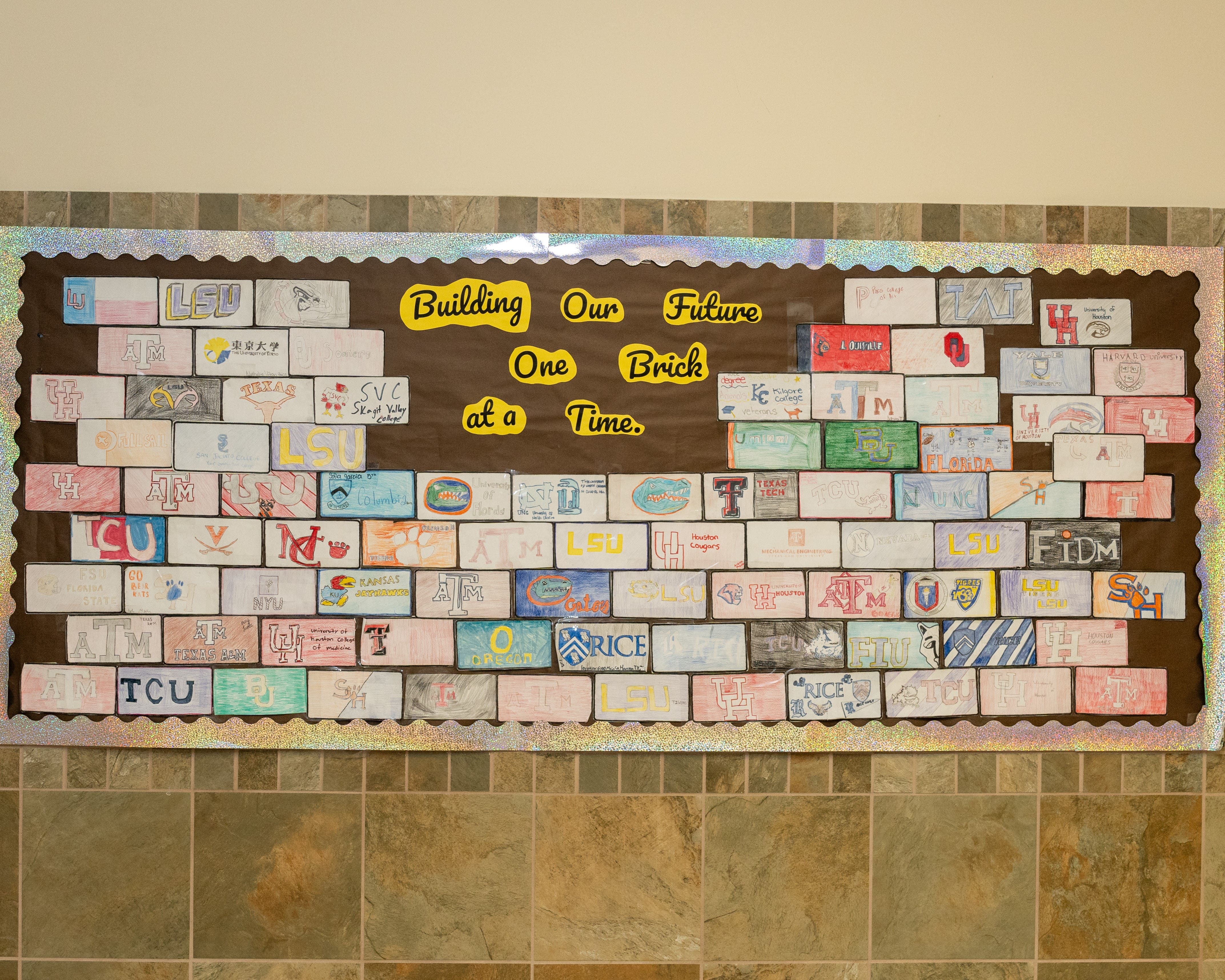 Bulletin board that says, "Building Our Future One Brick at a Time."