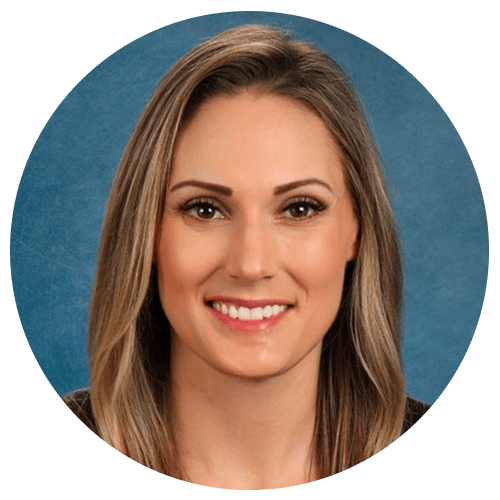 Person with shoulder-length hair in front of a blue background. Person with shoulder-length hair in front of a blue background.