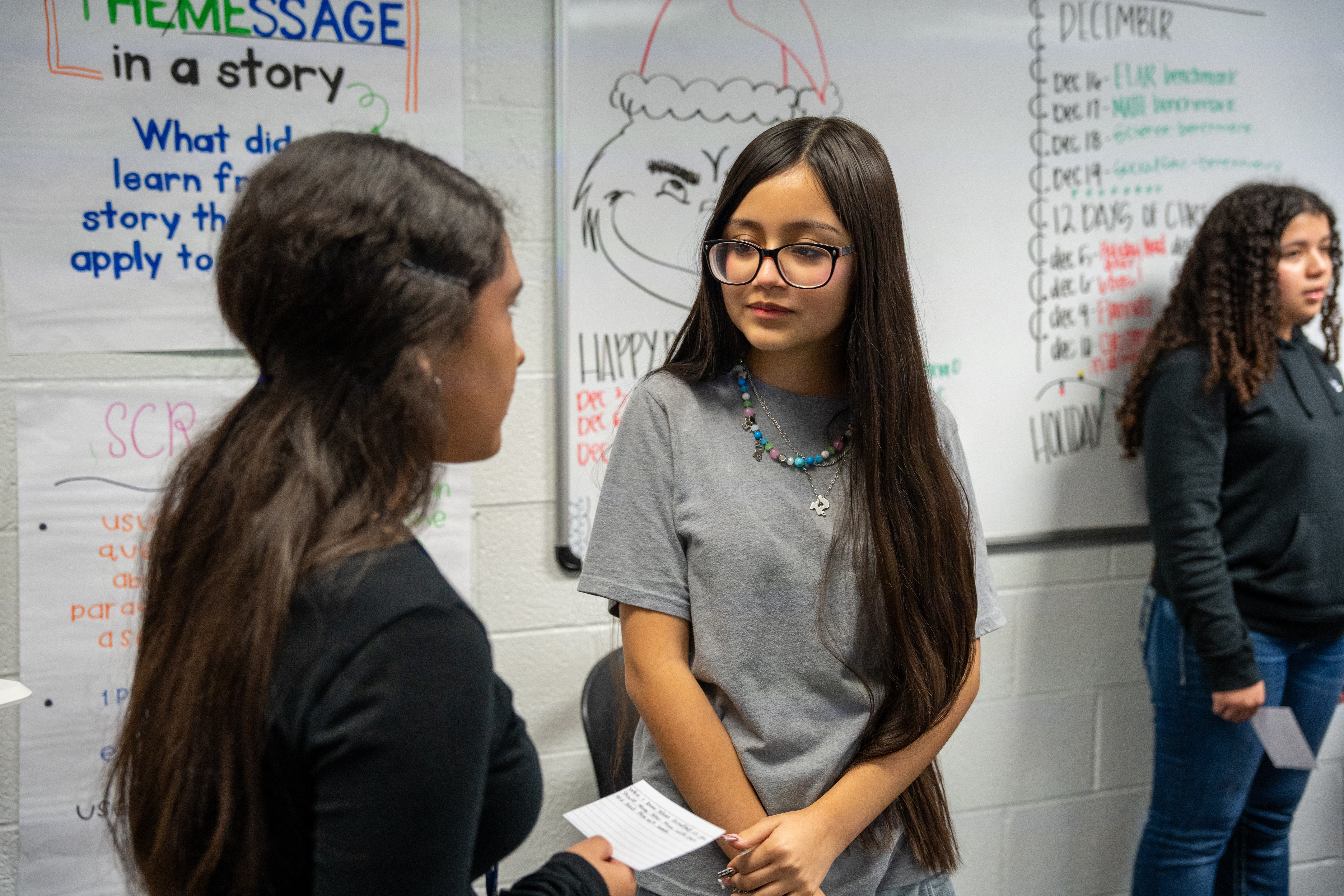 Two scholars speaking