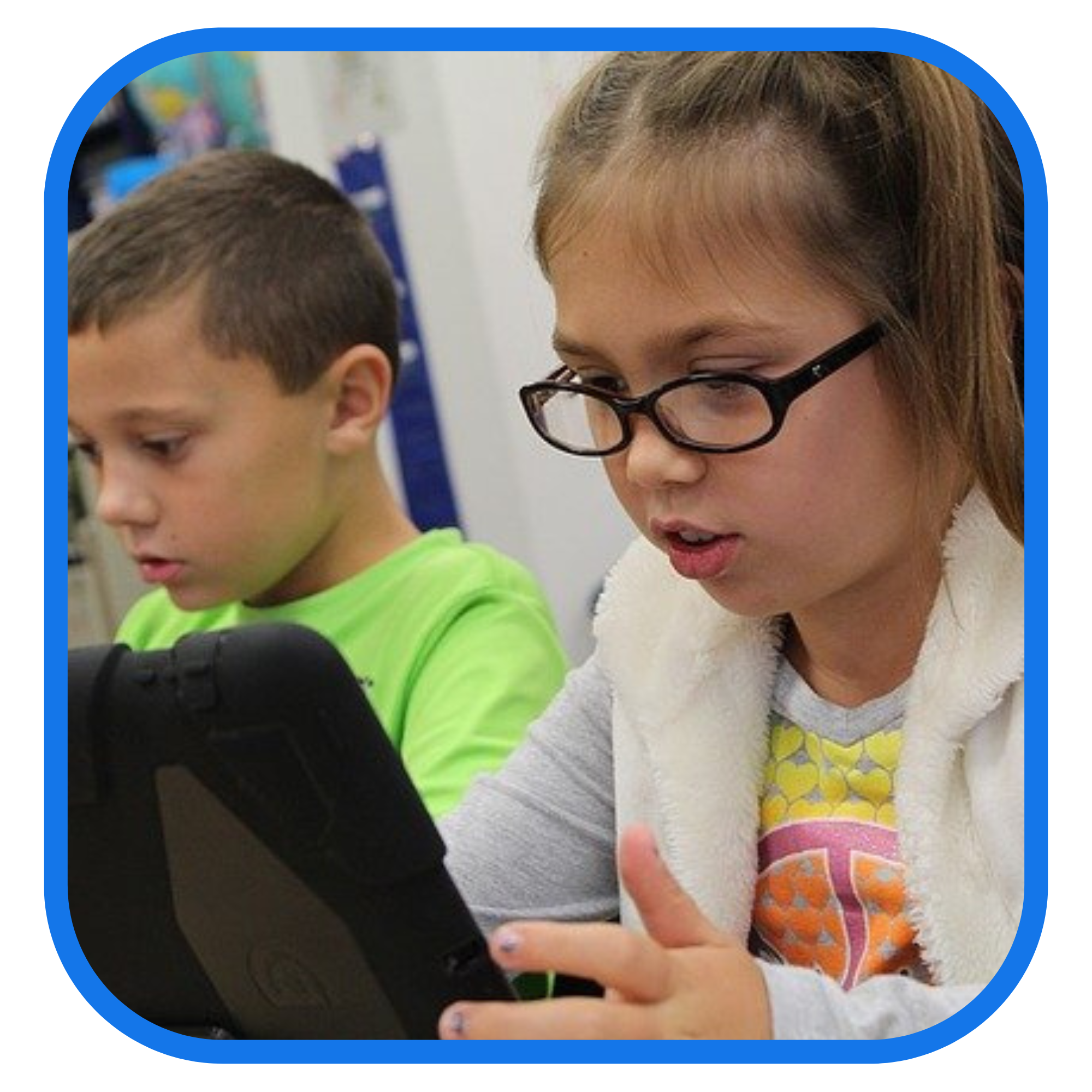 Two individuals using tablets, seated indoors.
