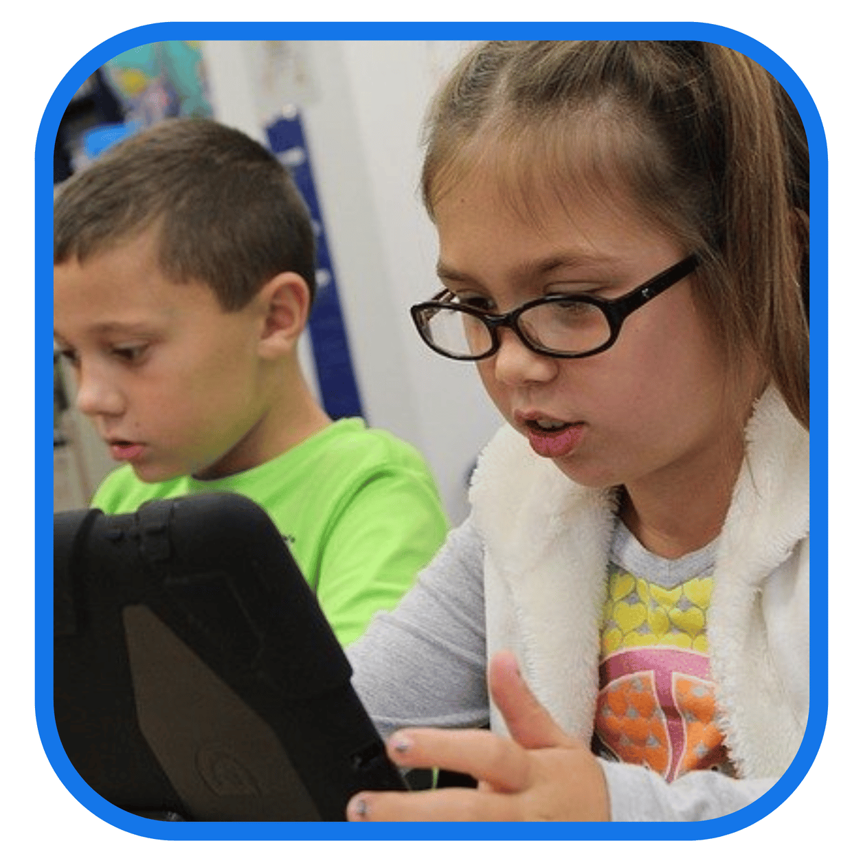 Two individuals using tablets, seated indoors. Two individuals using tablets, seated indoors.