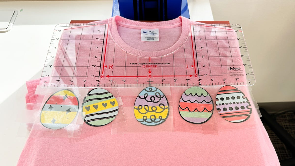 Planning the placement of the easter eggs using an acrylic t-shirt ruler.