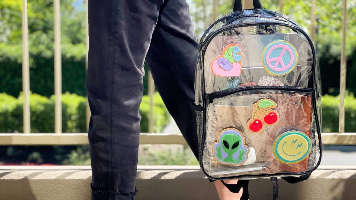 Clear back pack with patches.