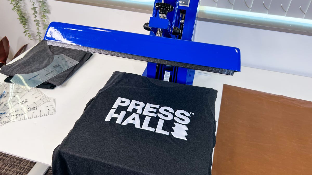 End product of pressing a heat transfer design onto a t-shirt.