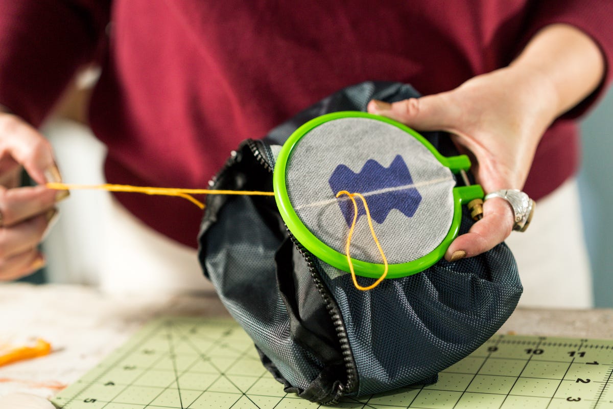 The first stitch on your embroidery project.