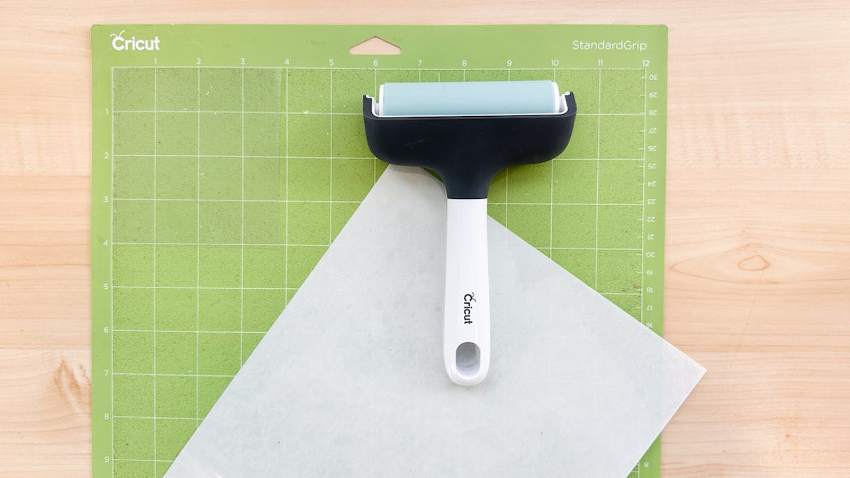 Place heat-safe transfer paper on the mat.