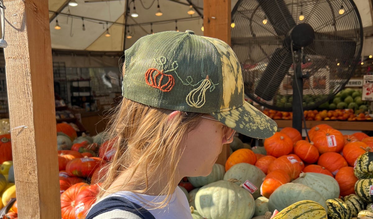 Split stitch of gourds on an army green hat.