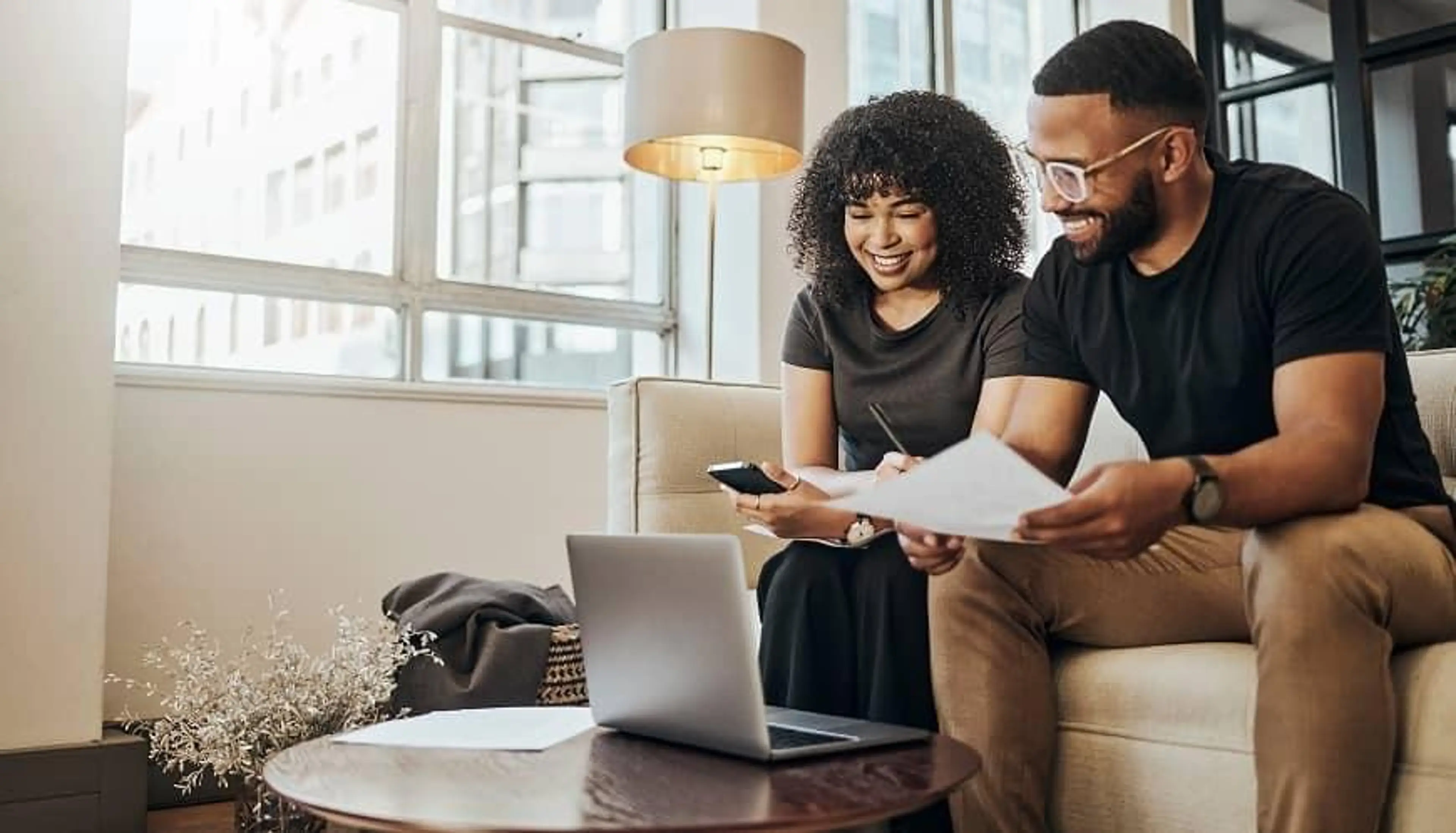 2 people reviewing their mortgage loan information
