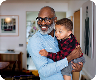 Senior holding a baby