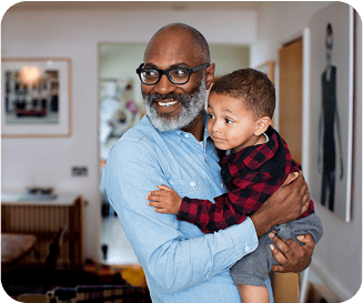 Senior holding a baby
