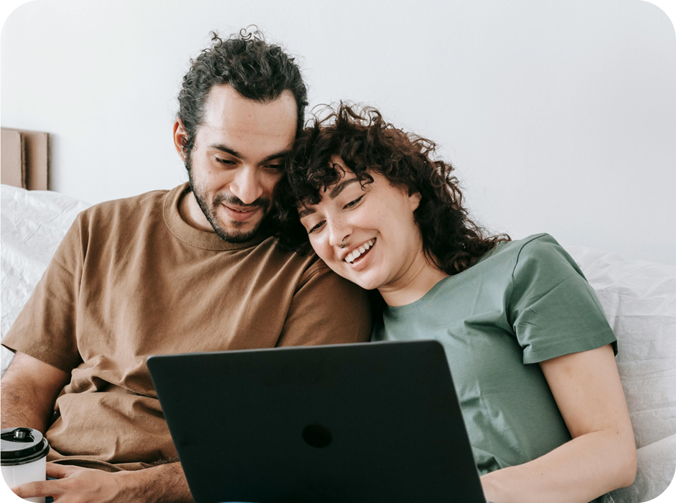 Couple on their laptop