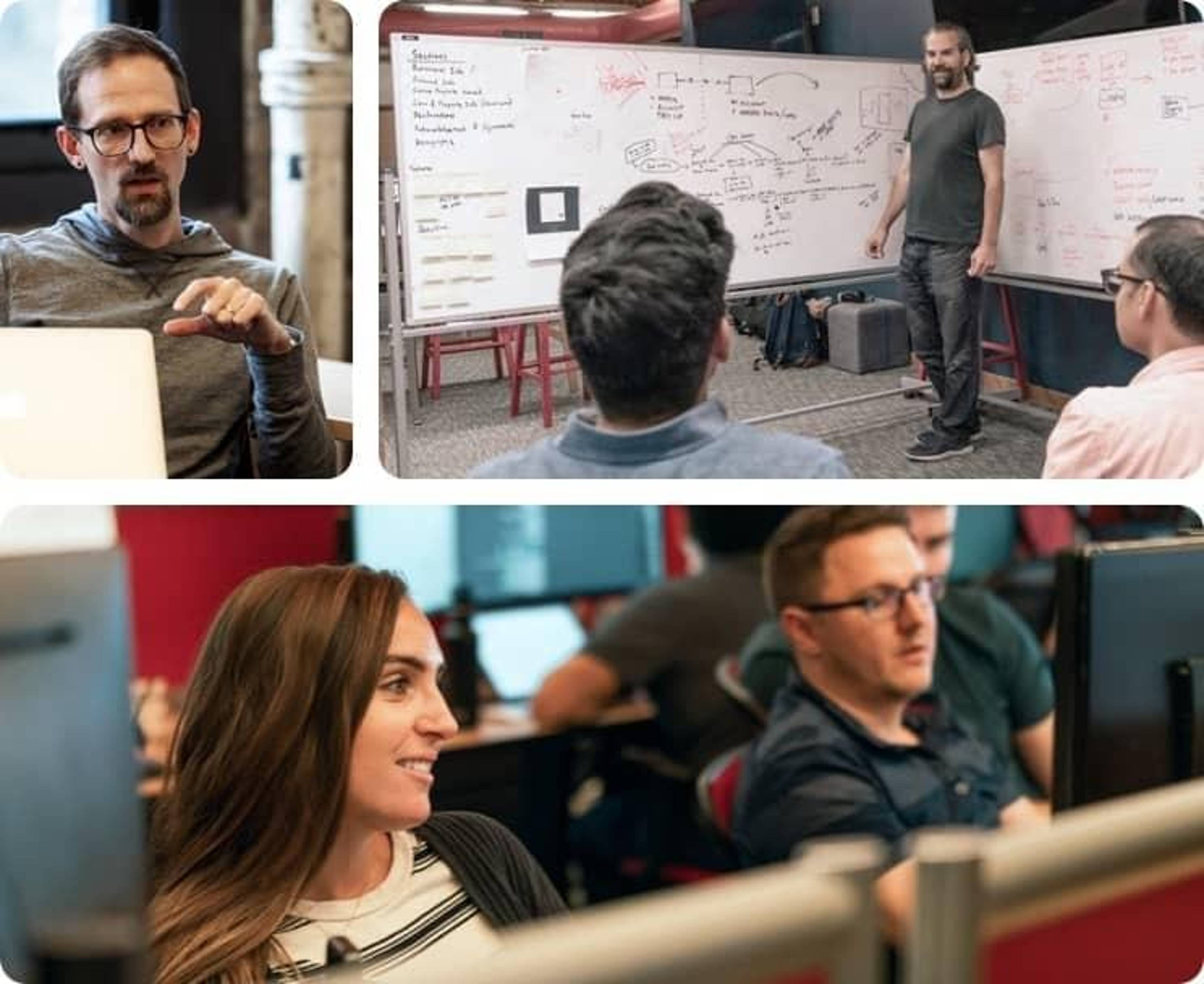 Rate employees discuss ideas while sitting together looking at a drawing board.