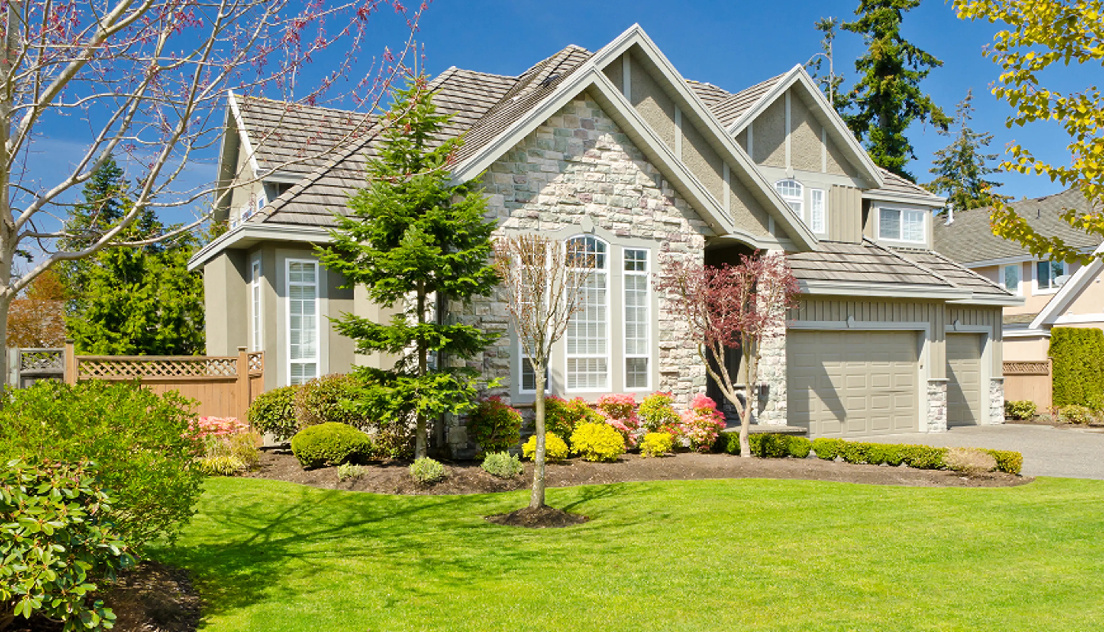 home with a front lawn.
