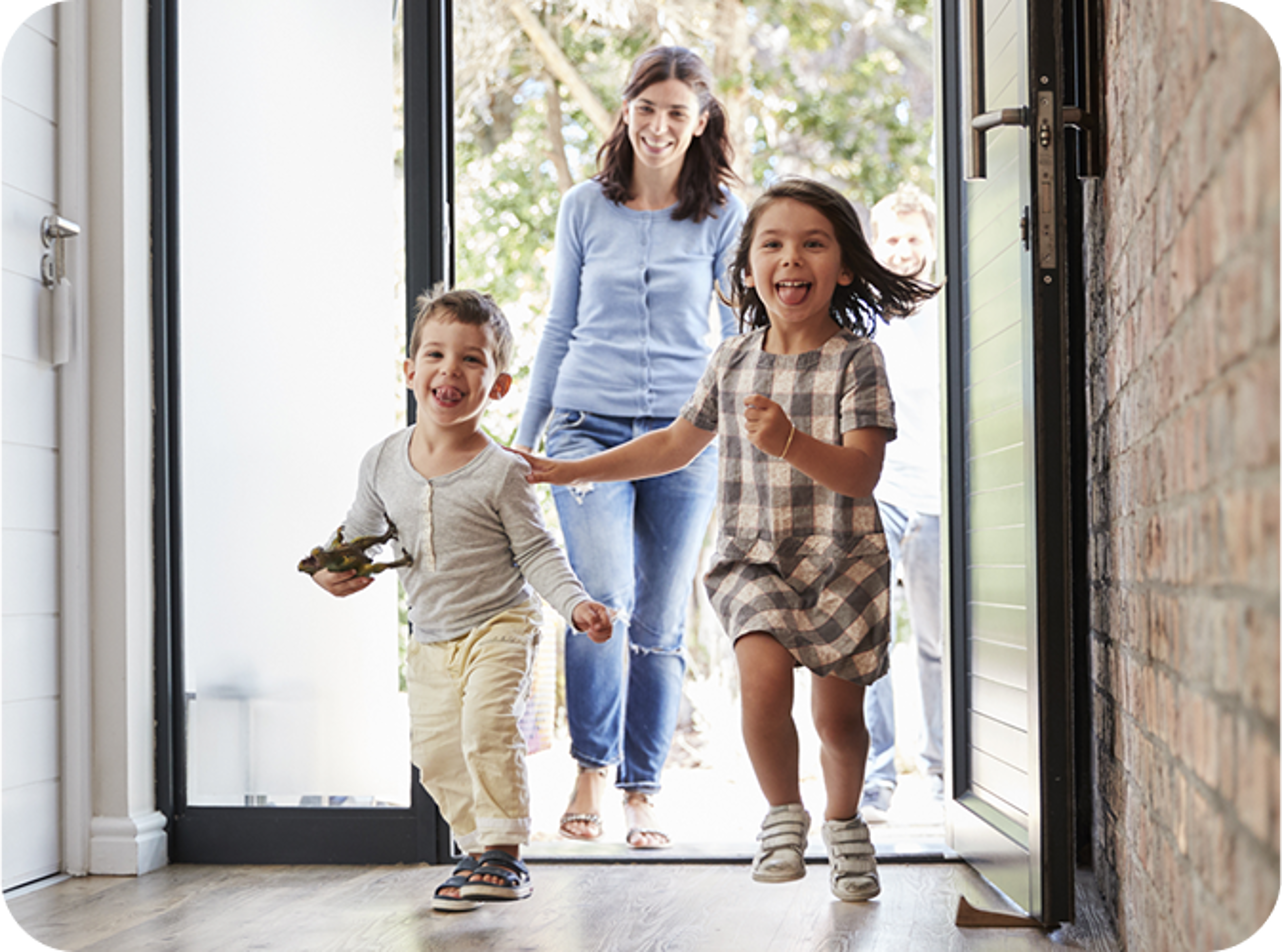 Children running inside a house
