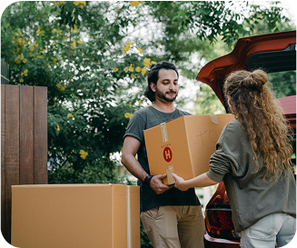 Couple moving boxes