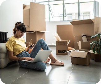 Woman on laptop with boxes around