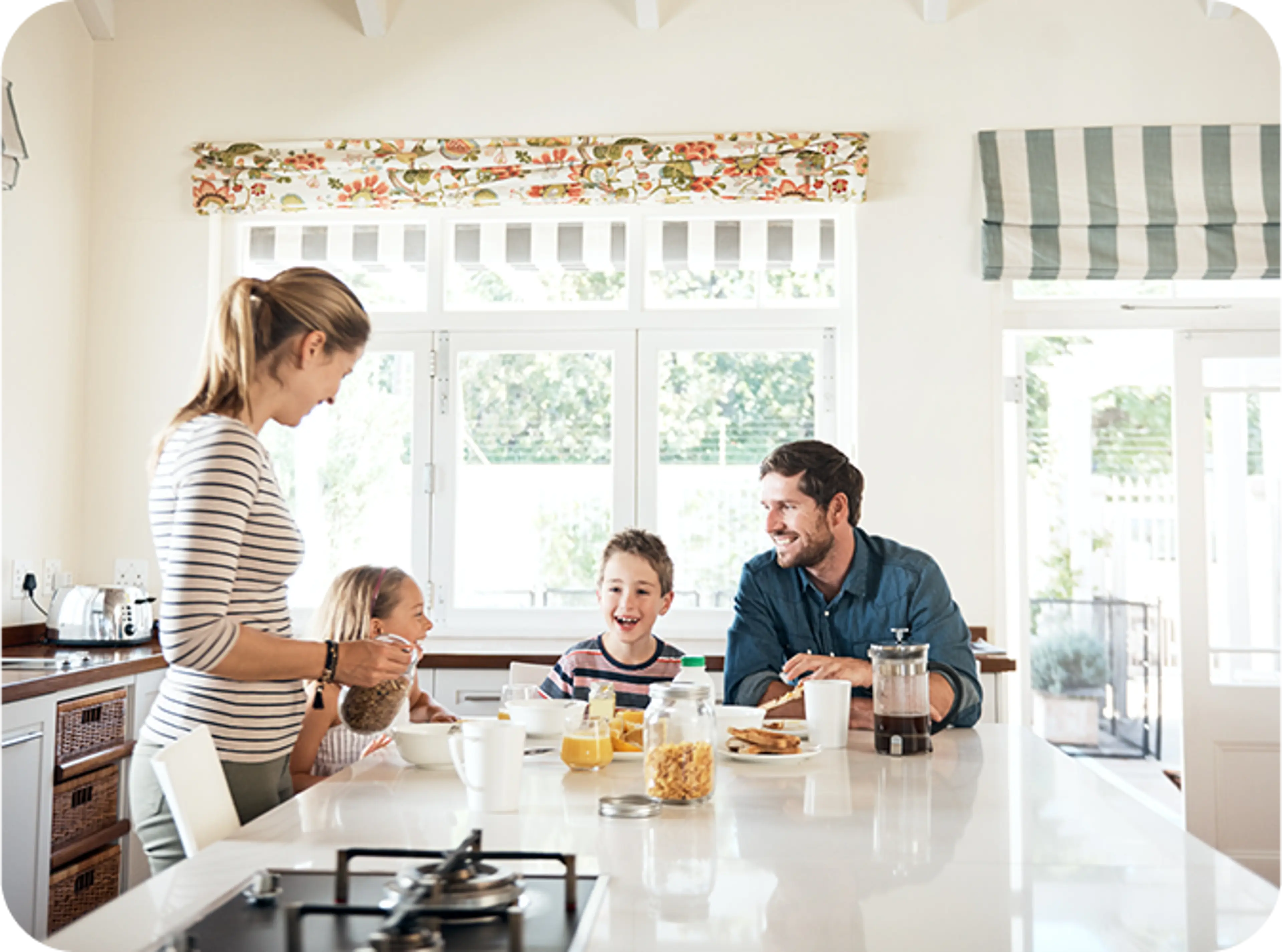 Family at kitchen island table