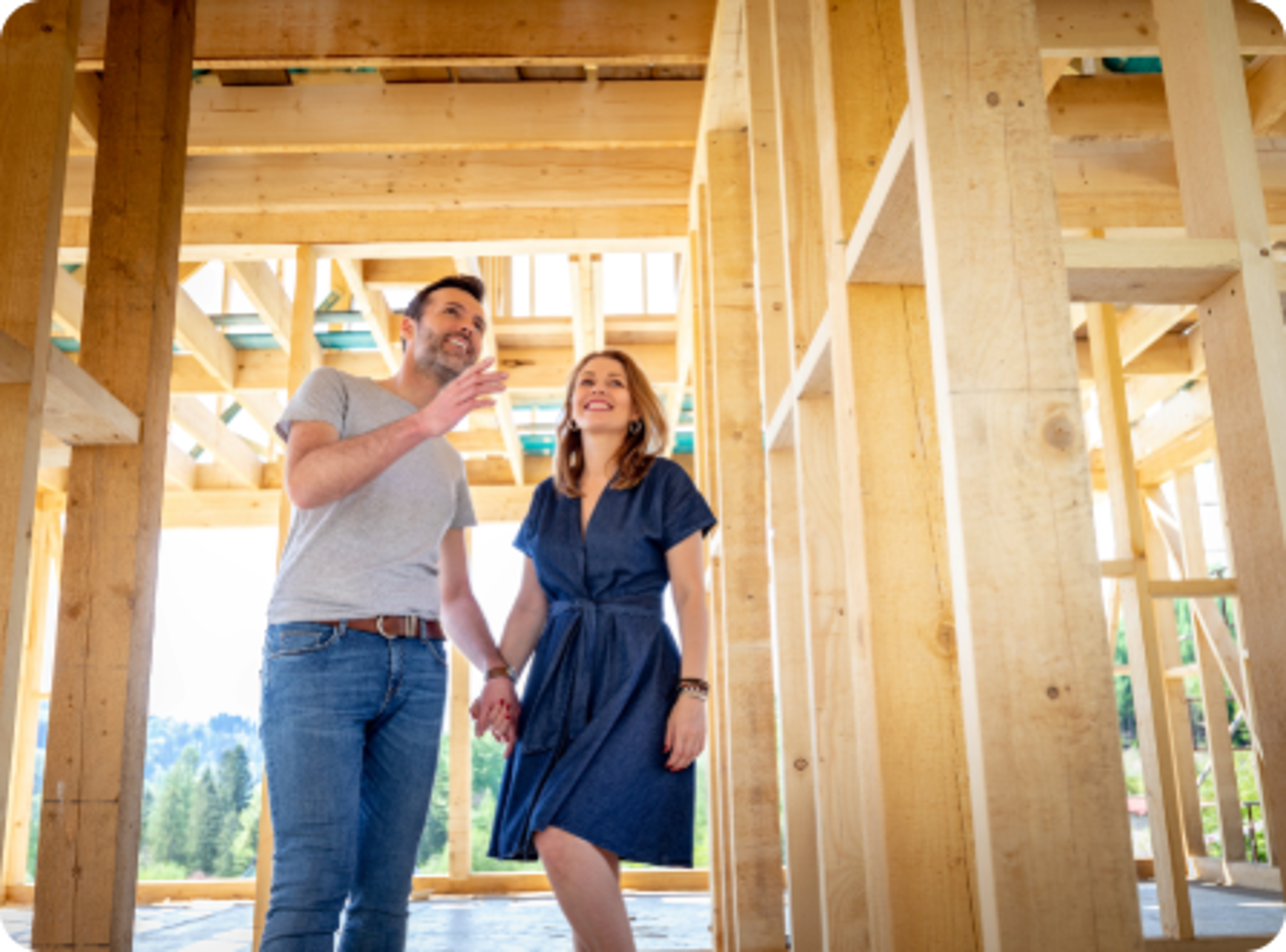 Homeowners looking at their home under construction