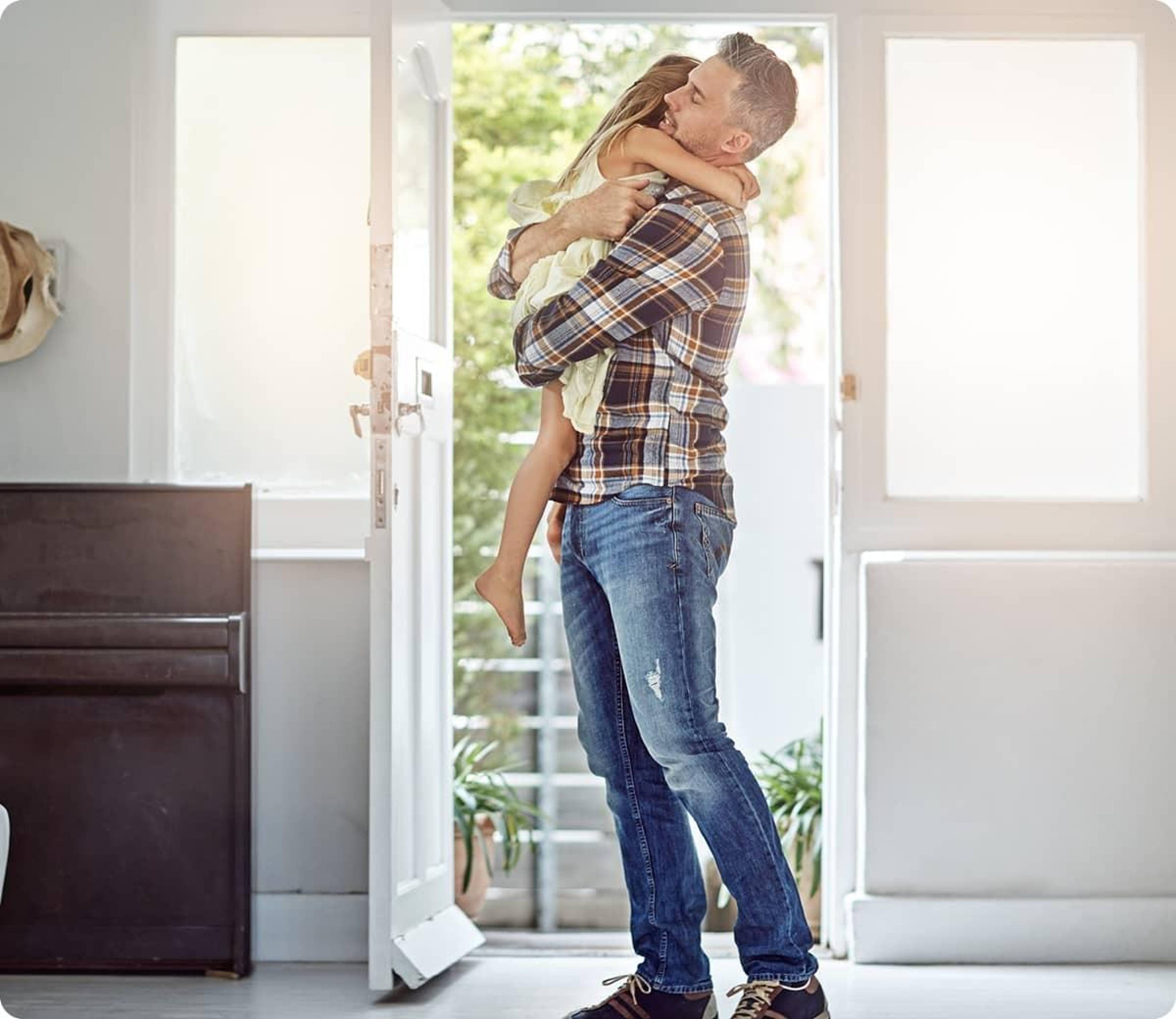 Man carrying his daughter