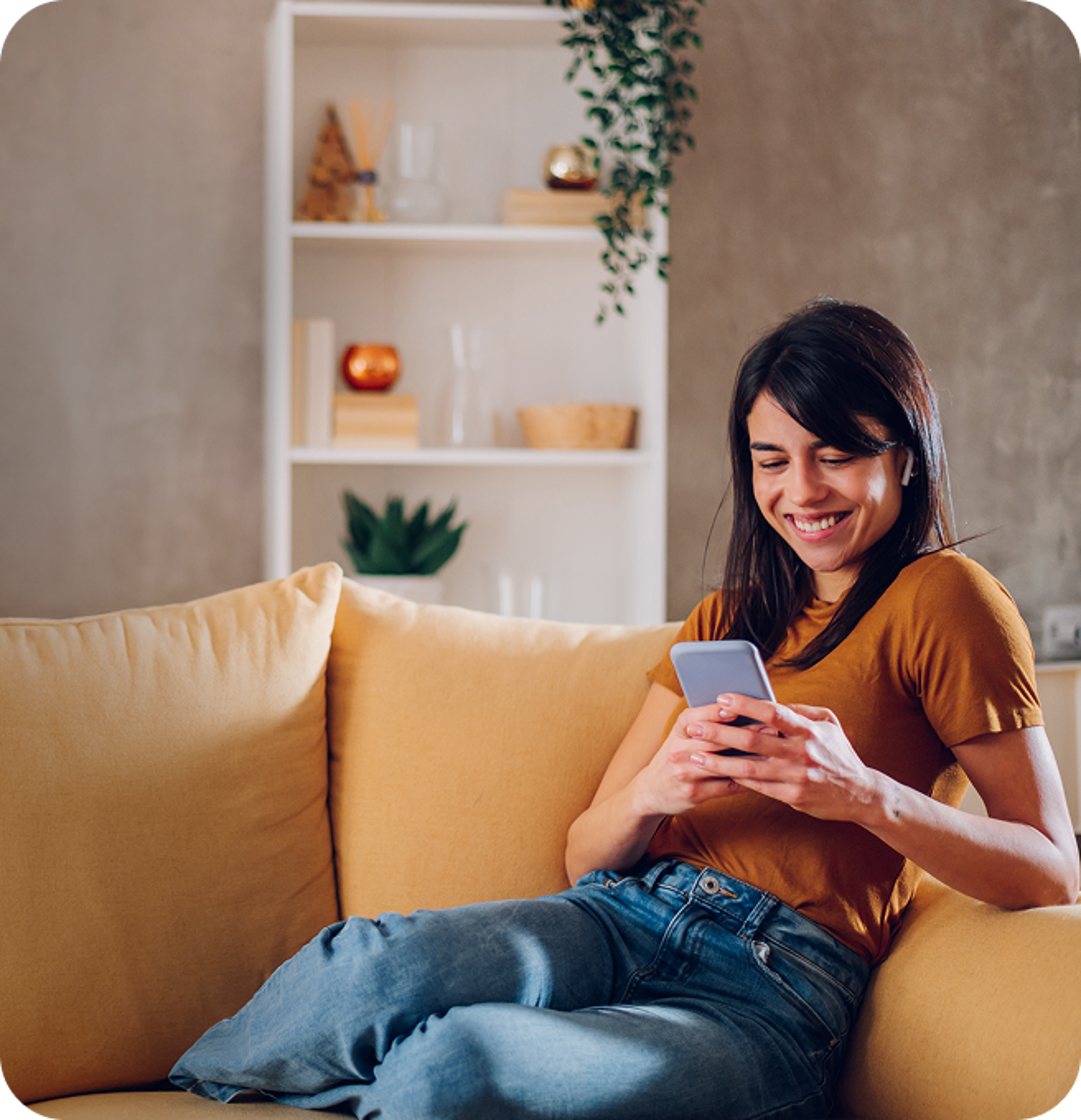 Women on the couch on her phone
