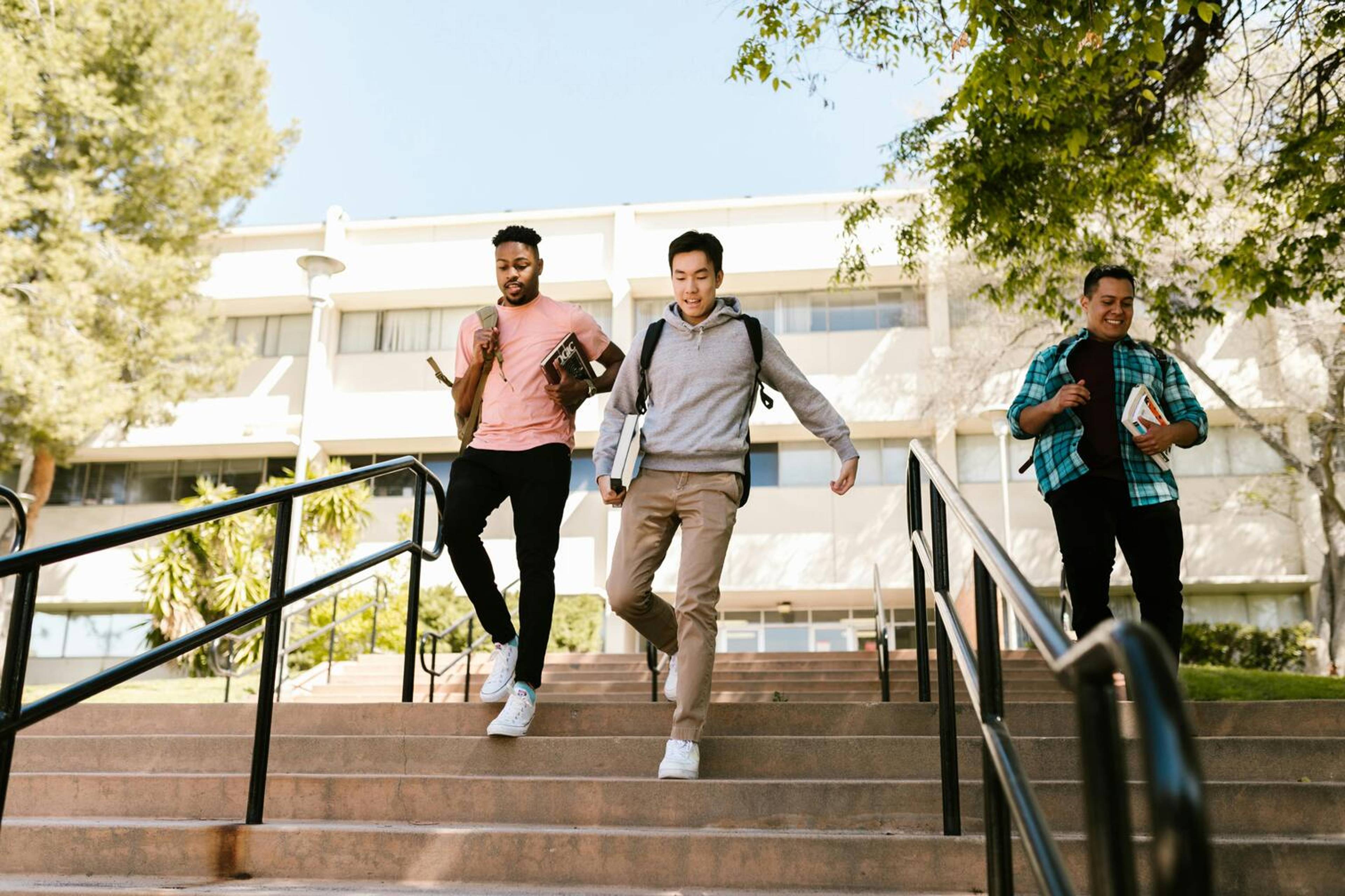 Students running down the stairs