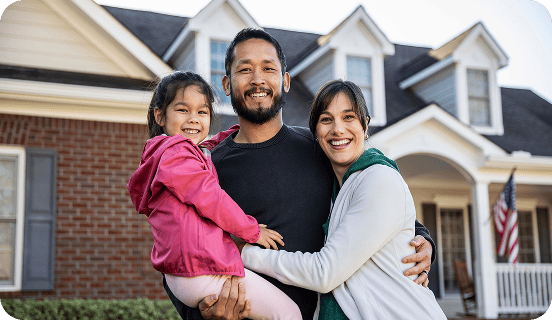 Family in front of home image