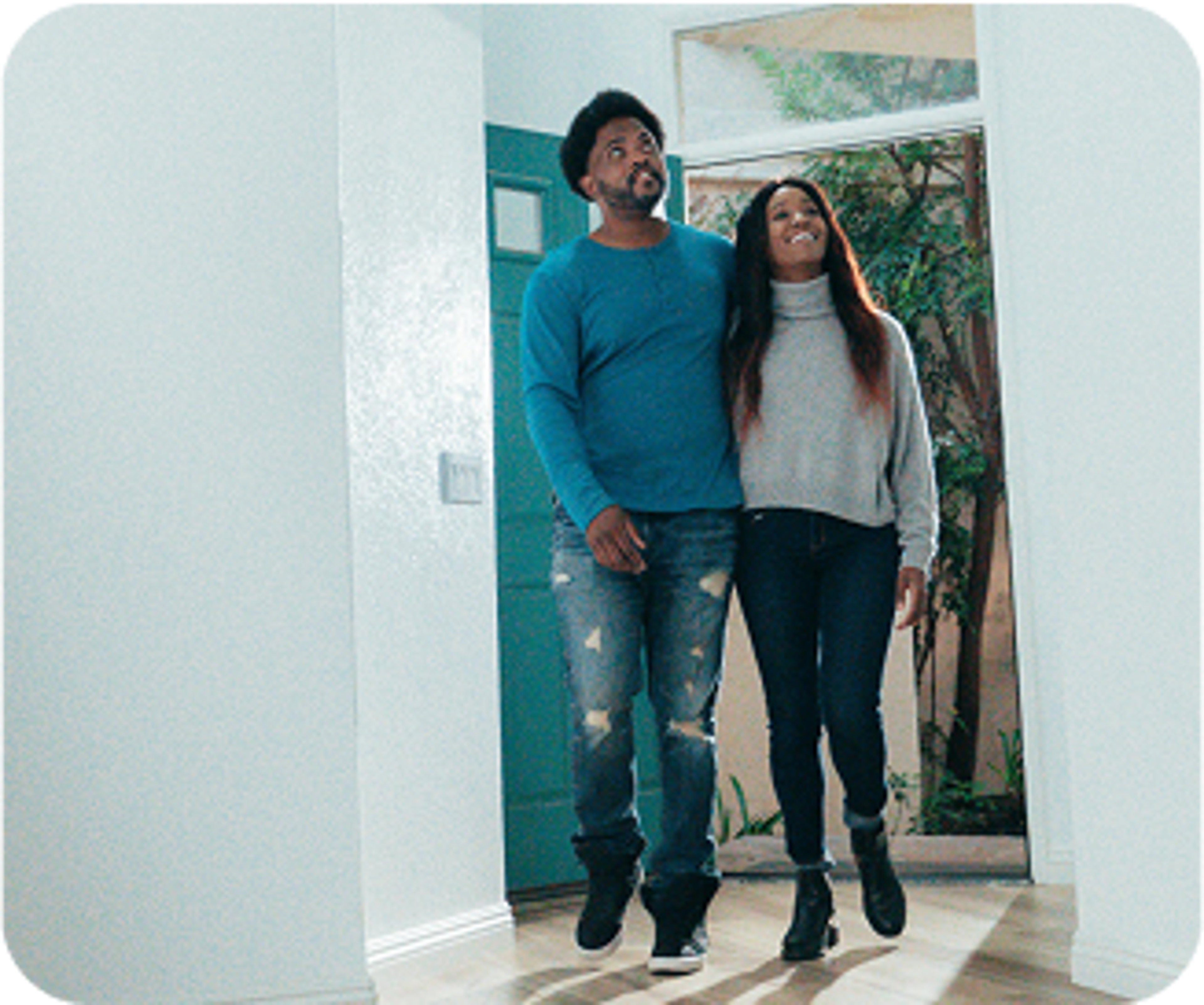 Couple walking through home