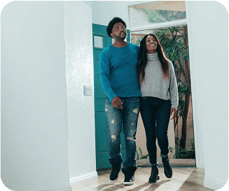 Couple walking through home