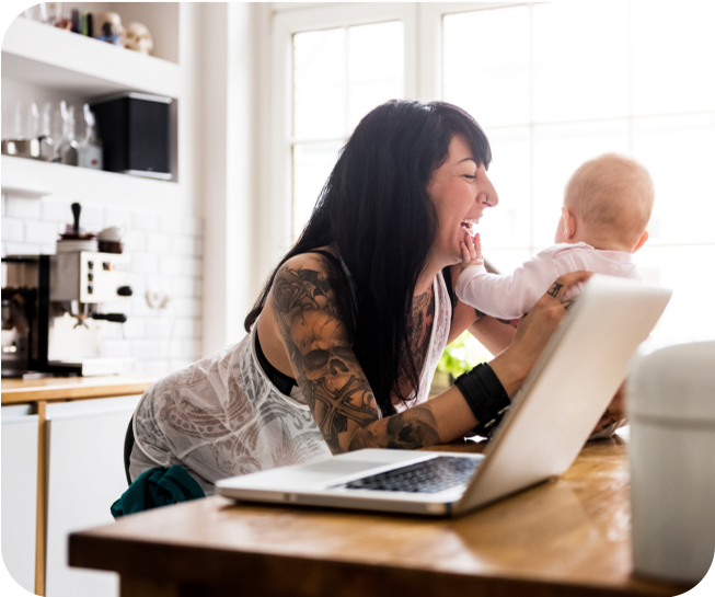 Woman holding baby on counter