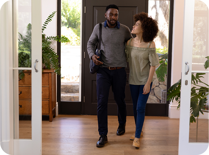 Couple walking in a house