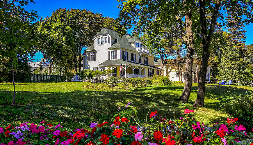 A home surrounded by flowers