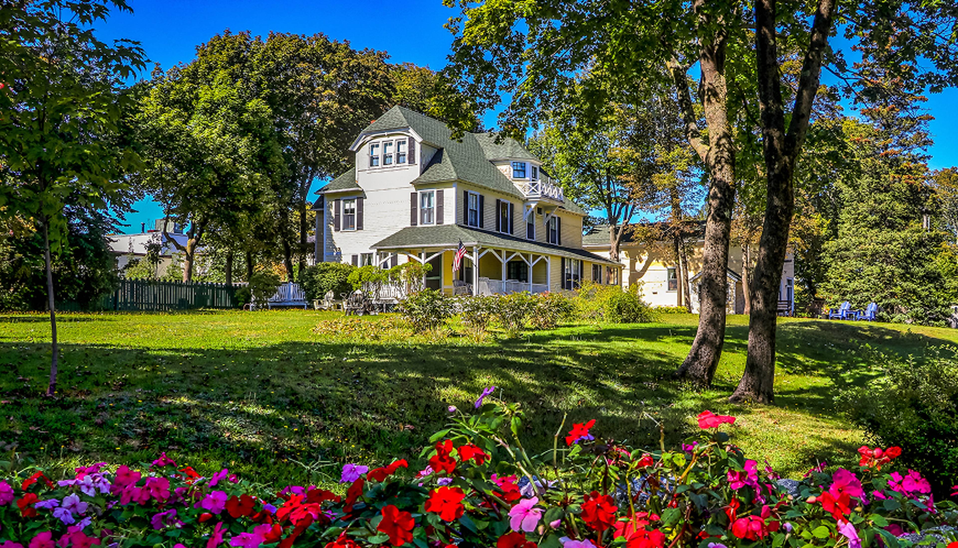 A home surrounded by flowers