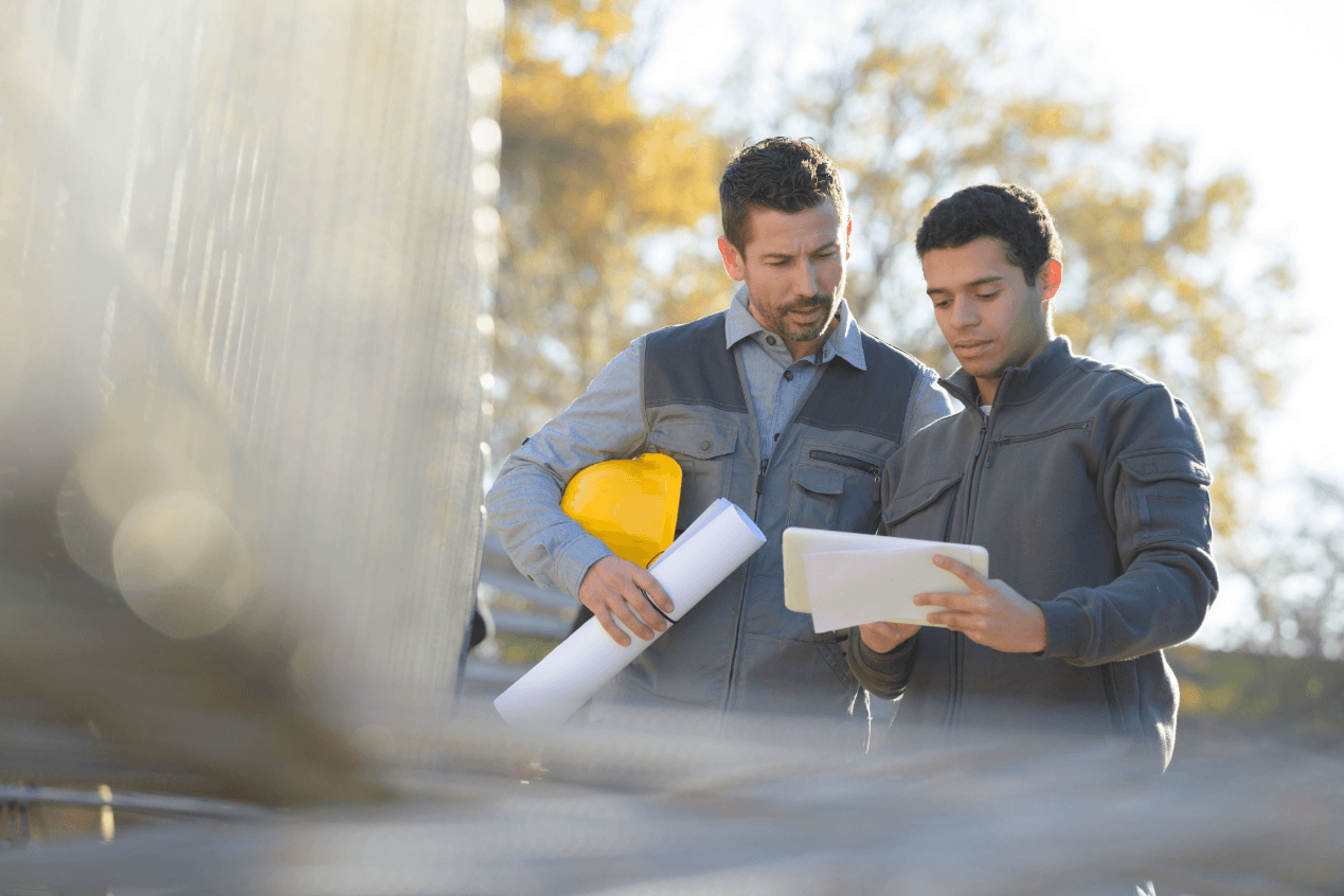 Builders looking at the plans.