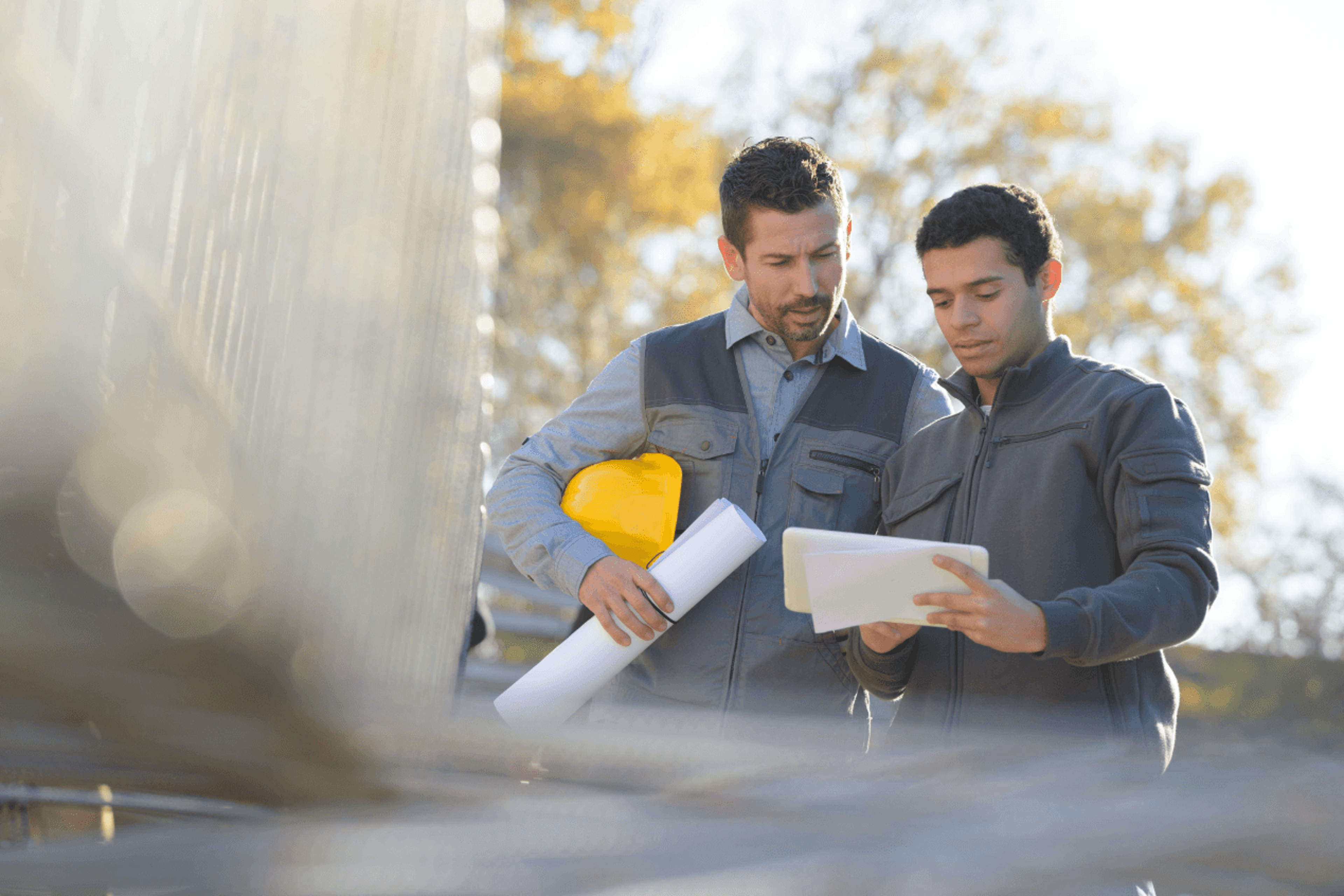 Builders looking at the plans.