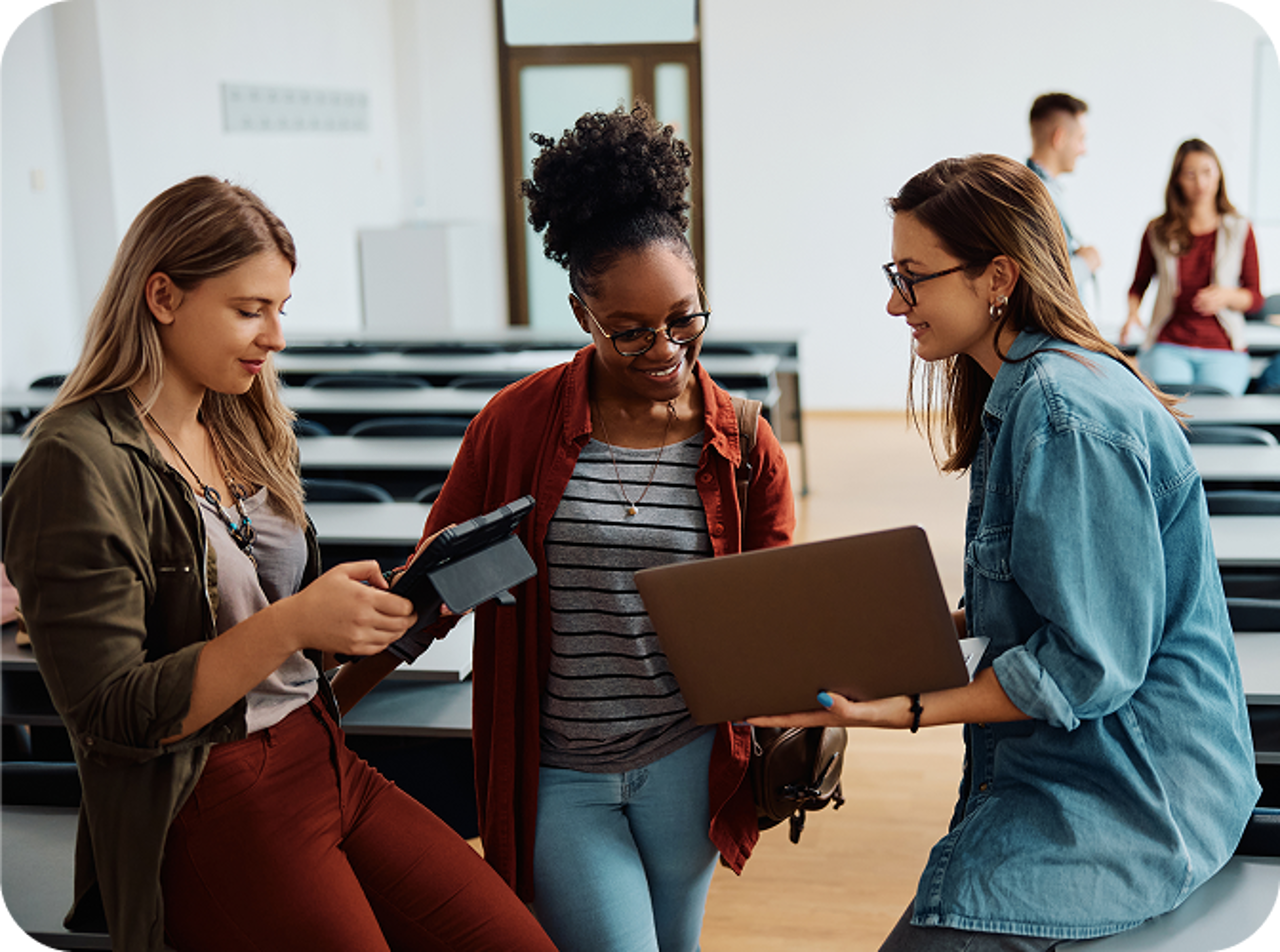 3 women looking at a file