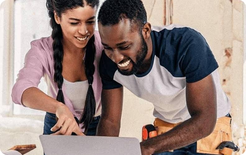 man and woman on laptop