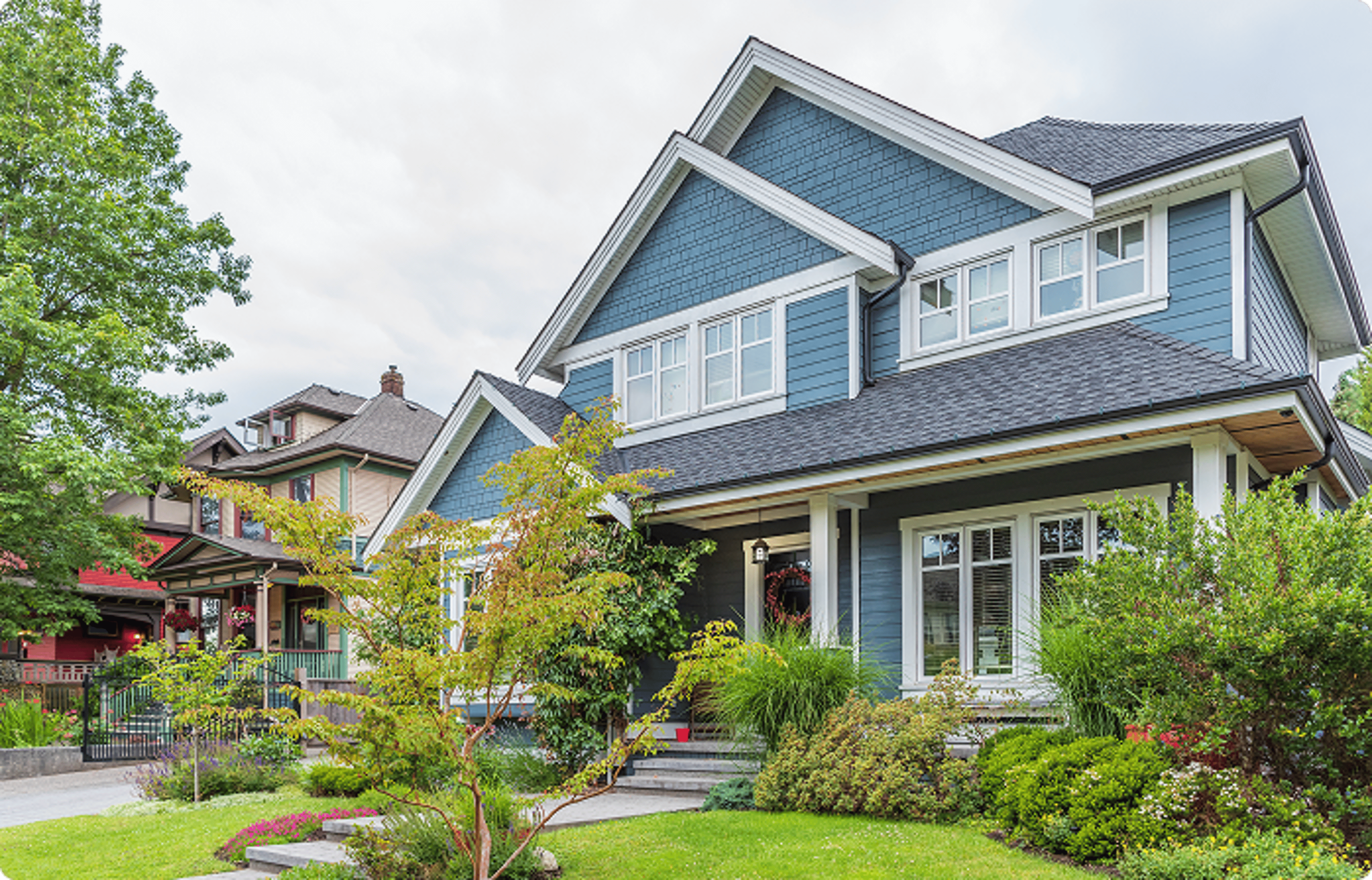 Rate Bridge - Blue two story house.