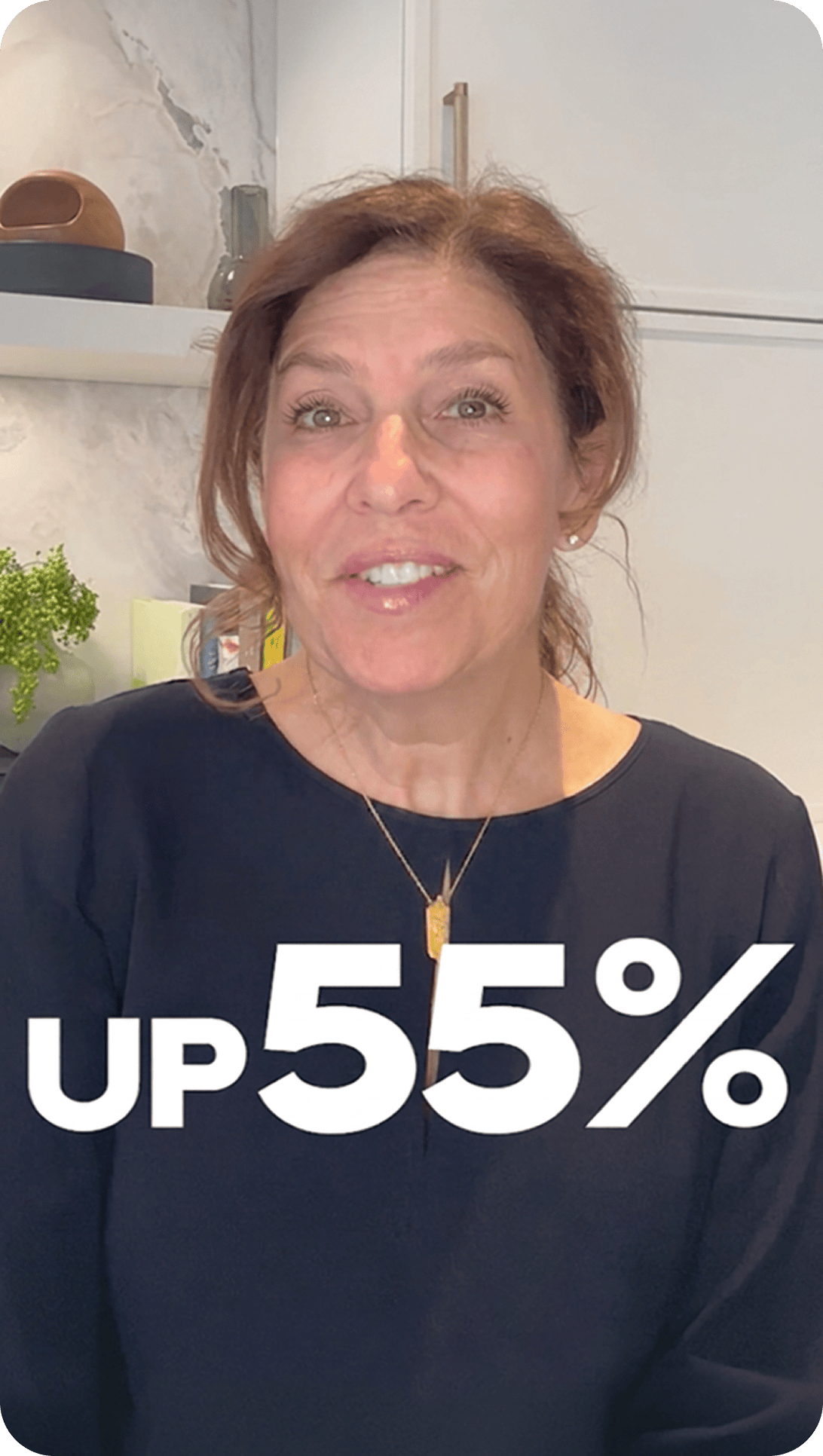 A person smiling with text that says "up 55%"