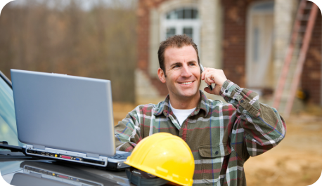 Construction worker talking on the phone