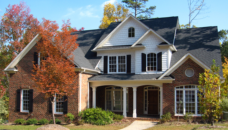 Family home with a walking path in the front of the house.