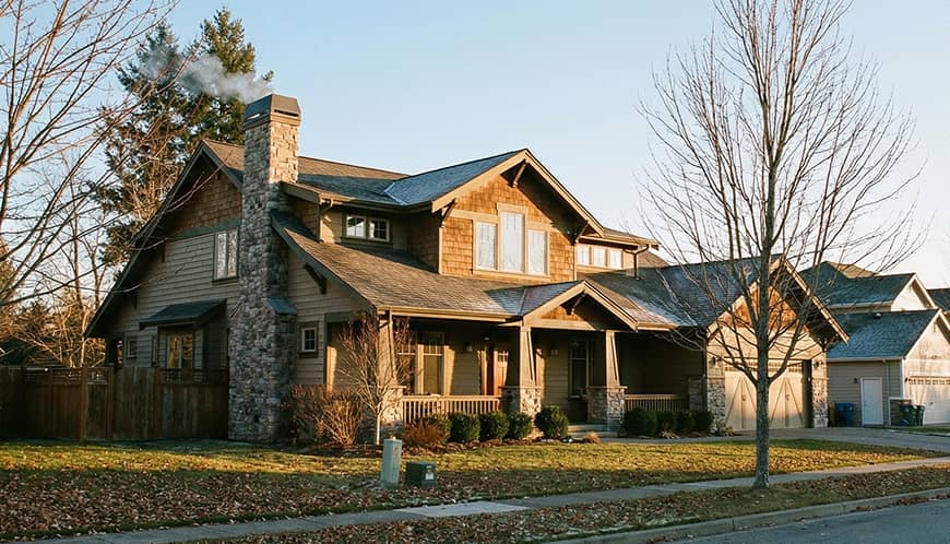 House with the sun rising on it.