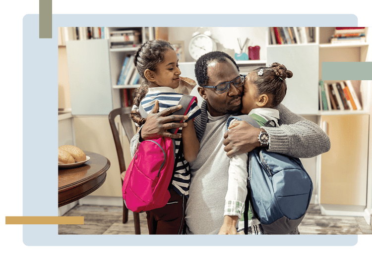 Man hugging 2 children