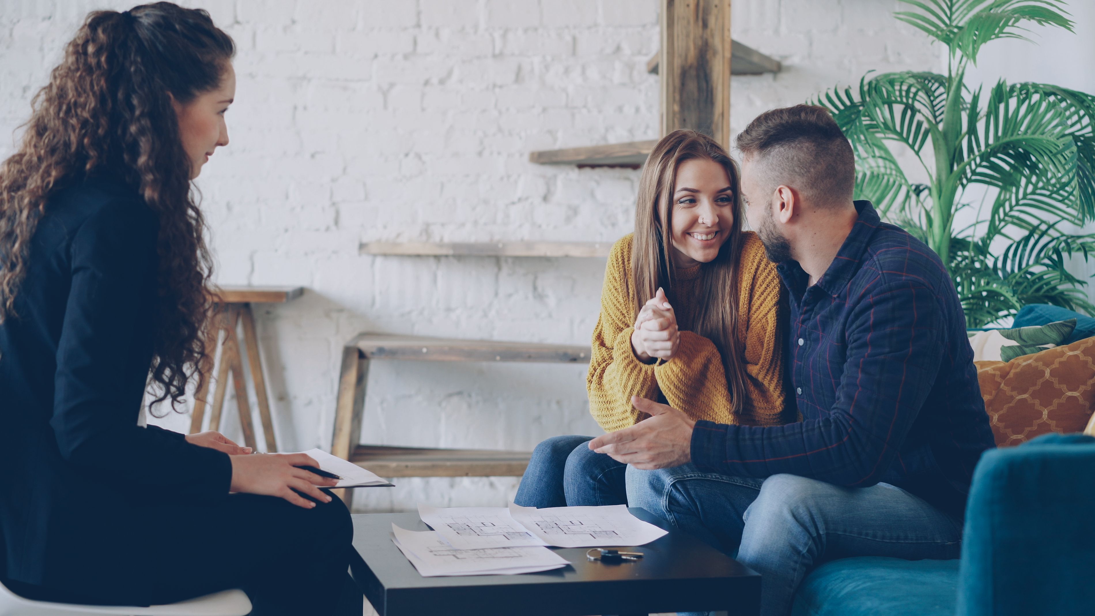 Couple discussing mortgage options with a loan officer