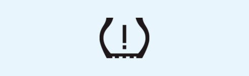 Tire pressure monitoring system (TPMS) light on a car dashboard