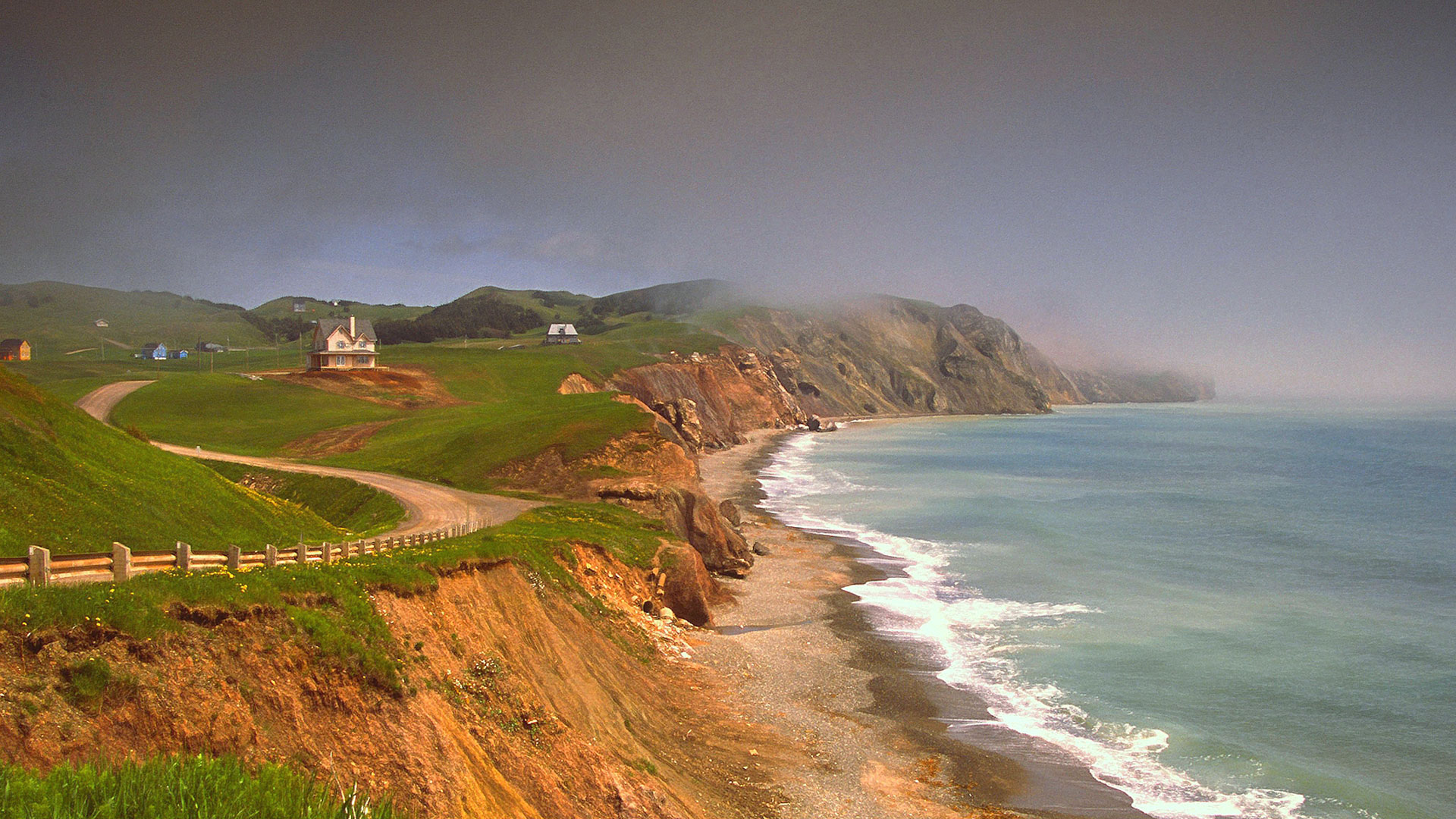 Coastal trail along red sandstone cliffs overlooking the sea in Havre-aux-Maisons, Magdalen Islands.