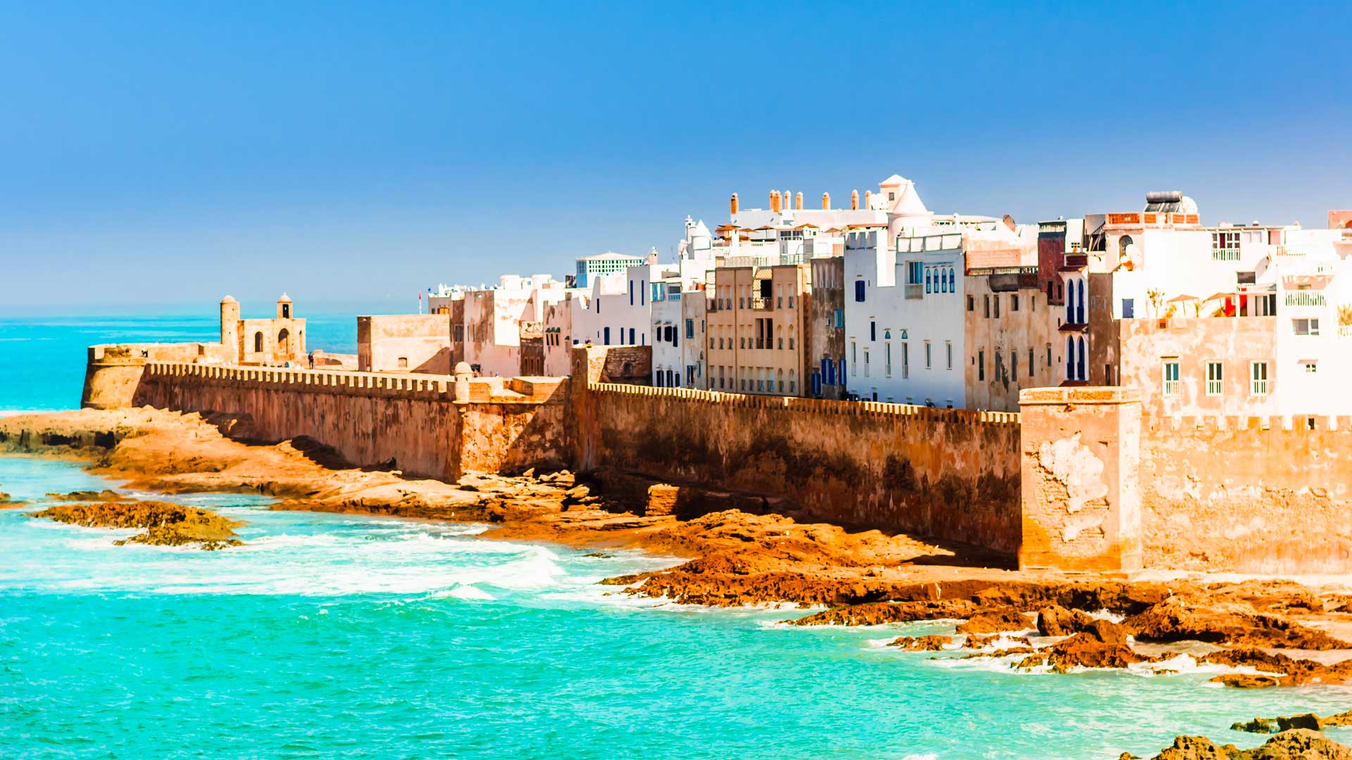 Panoramic view of Essaouira’s white medina and ocean-facing ramparts on Morocco’s Atlantic coast.