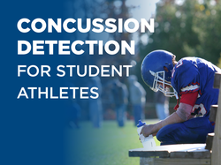 football player sitting on bench holding water bottle